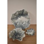 Three Deborah Brett ceramic dishes, decorated in her signature 'bubble glaze', the largest