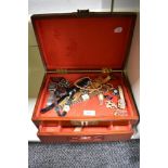 A large Chinese style wooden jewellery box containing a variety of costume jewellery including Casio