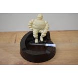 A Michelin man ash tray