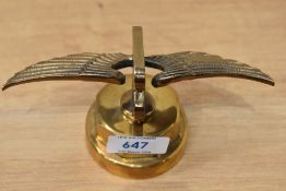 A vintage brass Bentley radiator cap mascot