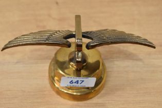 A vintage brass Bentley radiator cap mascot