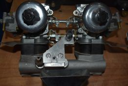 A set of twin 1.5in SU carbs with manifold to fit Mini and purpose built stainless Air filter box.