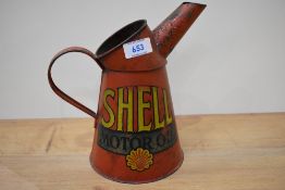 A vintage Shell oil pourer