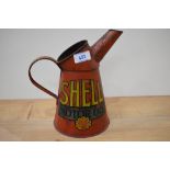 A vintage Shell oil pourer