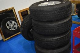 A set of five Landrover Defender alloy wheels and tyres. Roadstone Radian HT P265/75 R16 tyres new