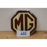 An MG car badge