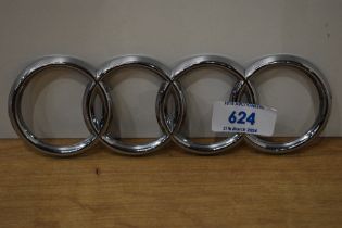 A set of Audi rings car badge