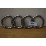 A set of Audi rings car badge