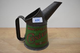 A vintage Castrol oil pourer