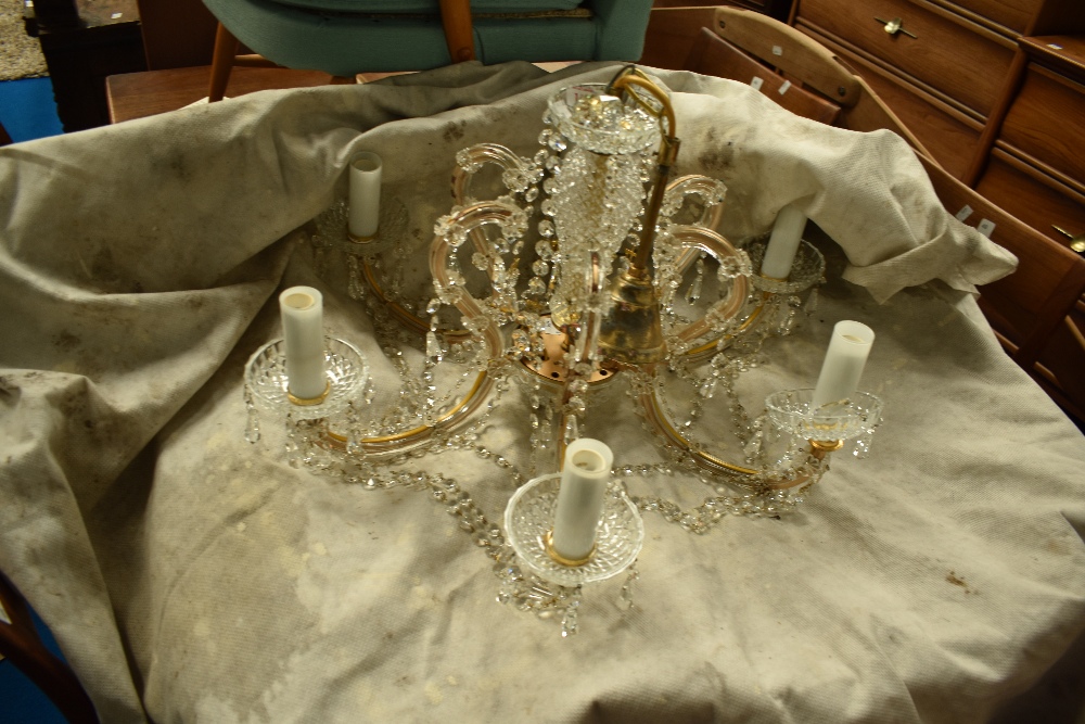 A traditional brass and glass electrolier chandelier , having six branches, diameter approx. 60cm