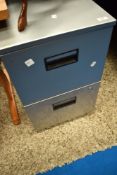 A traditional two drawer filing cabinet