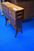 A Victorian oak Sutherland style occasional table