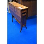 A Victorian oak Sutherland style occasional table