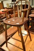 A vintage high chair (decorative only)