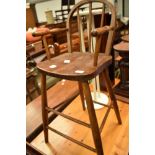 A vintage high chair (decorative only)