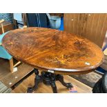 A 19th Century mahogany occasional table having inlaid top on quadruple column supports, approx.