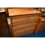A vintage chest of four stylised drawers, stamped Knechtel, dimensions approx W83 H105cm