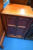 An interesting early 20th Century cabinet, possibly music or similar, with drop flaps to side and