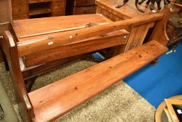 A traditional pitch pine pew, width 210cm