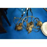 Three vintage suspended ceiling oil lamps