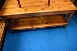 A pine coffee table having undershelf, dimensions approx. 106 x 53 x 46cm