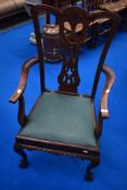 A reproduction Chippendale style carver chair