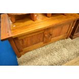 A modern hardwood TV stand or coffee table with cupboard under, approx. 120 x 65cm