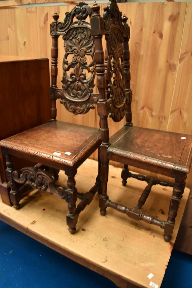 A pair of 19th Century Carolean style hall chairs