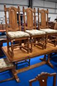 A modern Colonial style fold over dining table and four similar chairs , closed width approx.