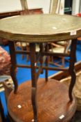 A vintage Anglo Indian style brass top occasional table