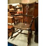 A 19th Century stained frame Windsor style rocking chair