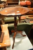 A reproduction wine table having scalloped oval top