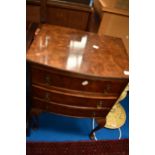 An early 20th Century Queen Anne style walnut bedside chest of three drawers