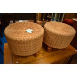 A pair of wicker stools