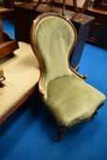 A Victorian spoonback nursing chair