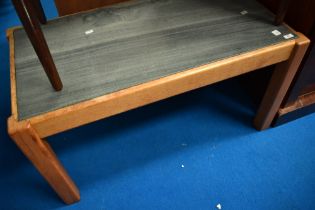 A vintage teak framed coffee table having slate top, approx. 97 x 52cm