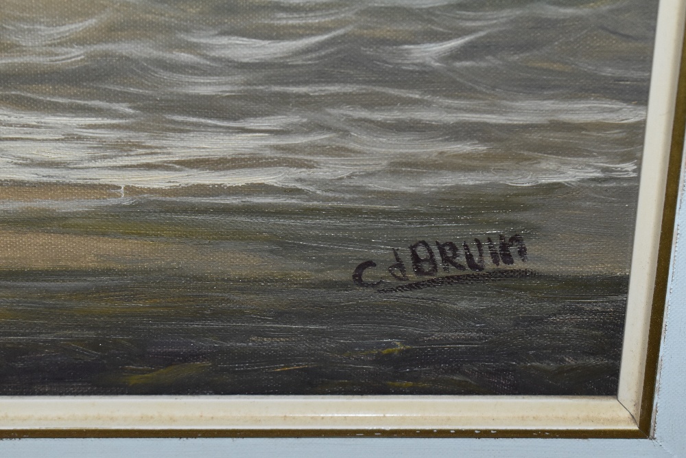 C. d. Bruin (20th Century, Continental), oil on canvas, A sunlit seascape with rocks to the - Image 3 of 4