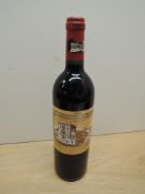 A bottle of Chateau Ducru-Beaucaillou 1995 Saint-Julien Grand Cru Classe De Medoc En 1855, Mis En