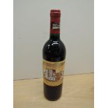 A bottle of Chateau Ducru-Beaucaillou 1995 Saint-Julien Grand Cru Classe De Medoc En 1855, Mis En