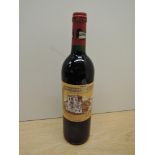 A bottle of Chateau Ducru-Beaucaillou 1995 Saint-Julien Grand Cru Classe De Medoc En 1855, Mis En