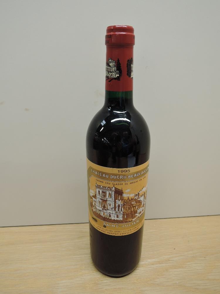 A bottle of Chateau Ducru-Beaucaillou 1995 Saint-Julien Grand Cru Classe De Medoc En 1855, Mis En