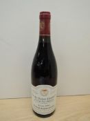 A bottle of Domaine Robert Arnoux Nuits-Saint-Georges, 1er Cru-Les Pro,ces Recolte 1999, Grand Vin