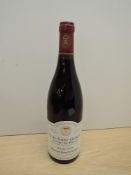 A bottle of Domaine Robert Arnoux Nuits-Saint-Georges, 1er Cru-Les Pro,ces Recolte 1999, Grand Vin