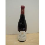 A bottle of Domaine Robert Arnoux Nuits-Saint-Georges, 1er Cru-Les Pro,ces Recolte 1999, Grand Vin