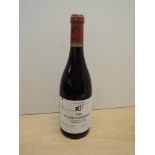 A bottle of R.E.Clos Vougeot 1999 Grand Cru, Domaine Rene Engel, Mis En Bouteilles A La Propriete,