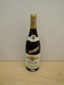 A bottle of Volnay 1999 Appellation D'Origine Volnay Controlee, Domaine Michael Lafarage, 13% vol,