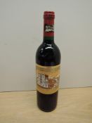 A bottle of Chateau Ducru-Beaucaillou 1995 Saint-Julien Grand Cru Classe De Medoc En 1855, Mis En