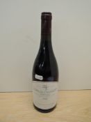 A bottle of Chapelle-Chambertin 1999 Grand Cru, Appellation Chapelle-Chambertin Controlee Red