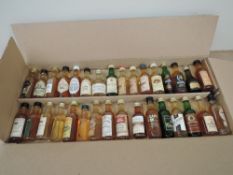 Thirty One miniature bottles of Single Malt Whisky including Glen Grant, Glenlivet, Glenmorangie,
