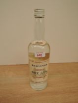 A bottle of Rawlings London Dry Gin, The Smoothest Made, no strength or capacity stated, approved